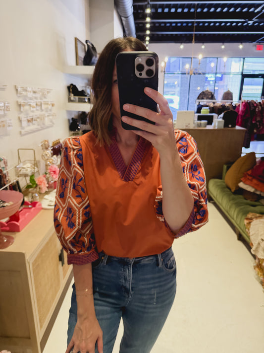 The Orange Geometric Floral Top