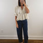 The Ruffle Peplum Top in Cream