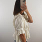 The Ruffle Peplum Top in Cream