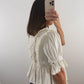The Ruffle Peplum Top in Cream