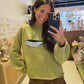 The Catch Sweater