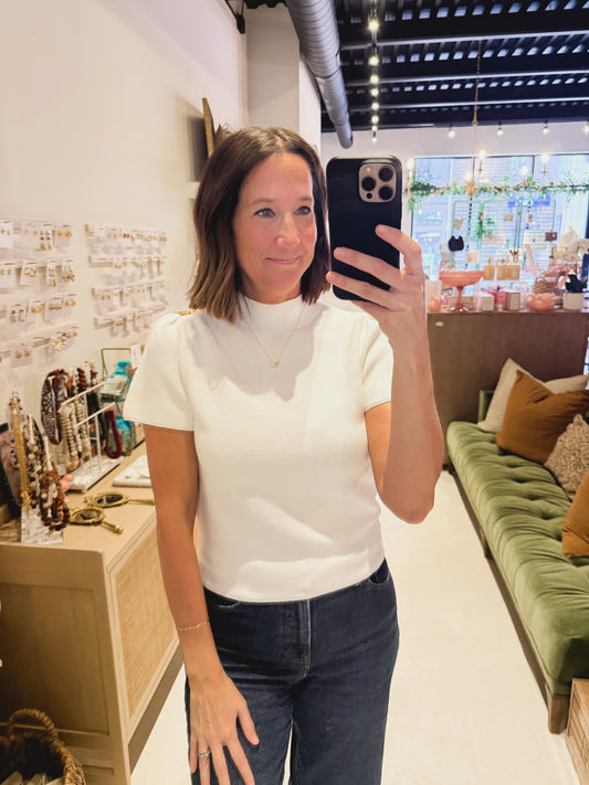 The White Ribbed Mock Neck Top