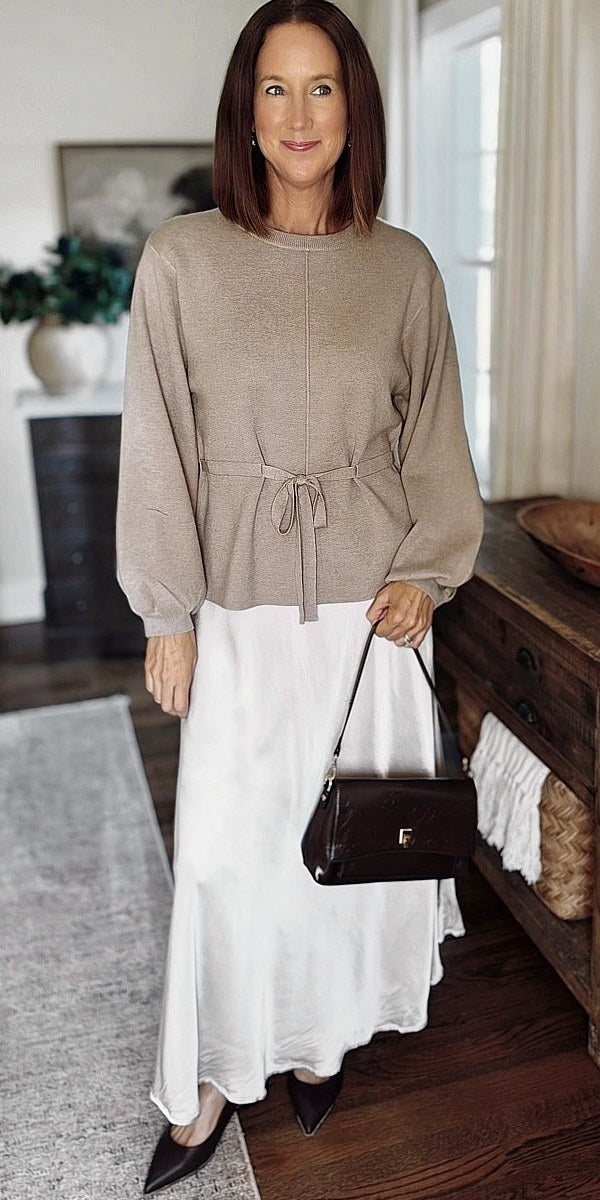 Taupe tie-waist sweater with a white satin maxi skirt